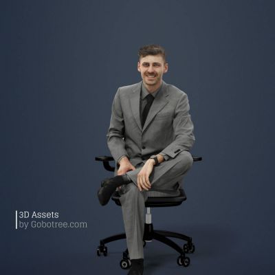 穿西装坐在办公椅子上的男人